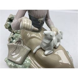 Four Lladro figures, comprising Feed Time no 1312, Young Shepherdess no 4576, Girl with Duck no 4682 and Little ducks with Mother no 4682, largest example H24cm 