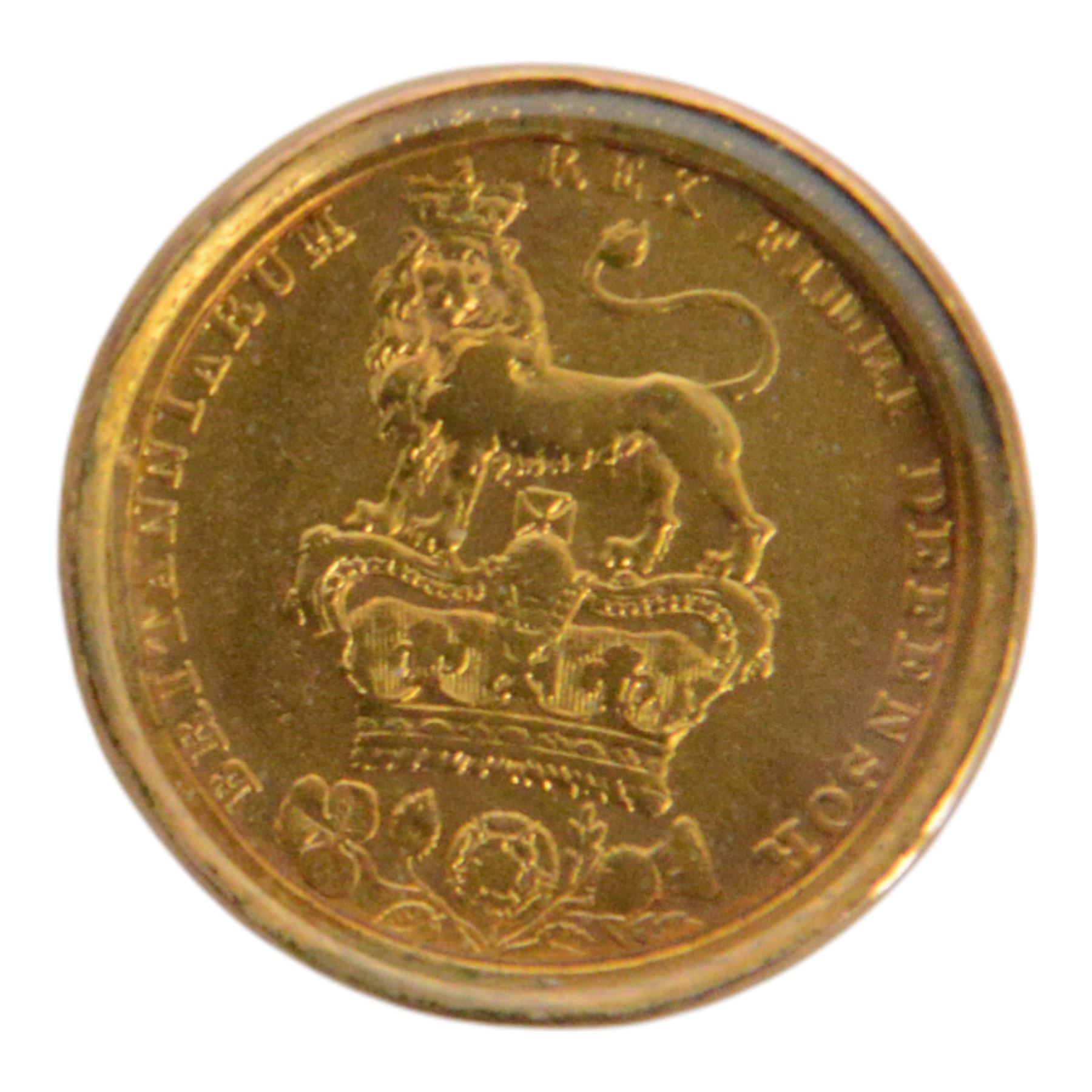 George IV 1825 silver one shilling coin, gilded, in glazed 9ct gold surround