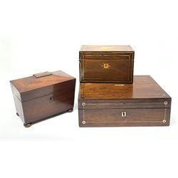 Three 19th century boxes, comprising a mahogany mother of pearl inlaid writing slope, L30cm, a mahogany tea caddy, of sarcophagus form with twin compartmented interior, raised upon four compressed bun feet, H16cm, and a mahogany and brass inlaid caddy, L20cm. 