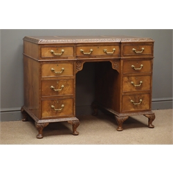  Small early 20th century circa. 1930 walnut desk, reverse break front top with acanthus leaf moulding, three sectional tooled leather inset, nine drawers, W104cm, H79cm, D59cm  