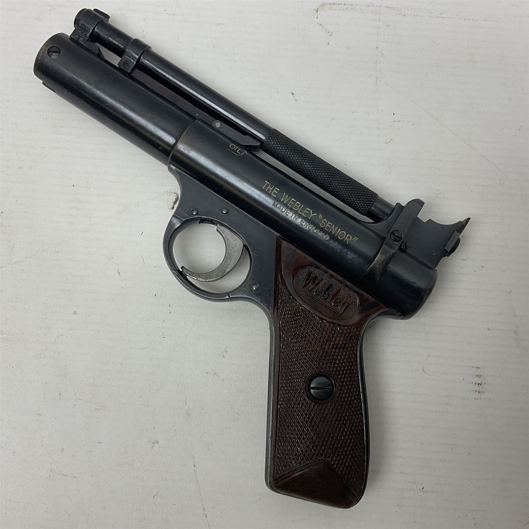 Webley Senior .22 cal. air pistol with top lever action, serial no.273; in original box with label under lid; together with two tins of pellets NB: AGE RESTRICTIONS APPLY TO THE PURCHASE OF AIR WEAPONS.