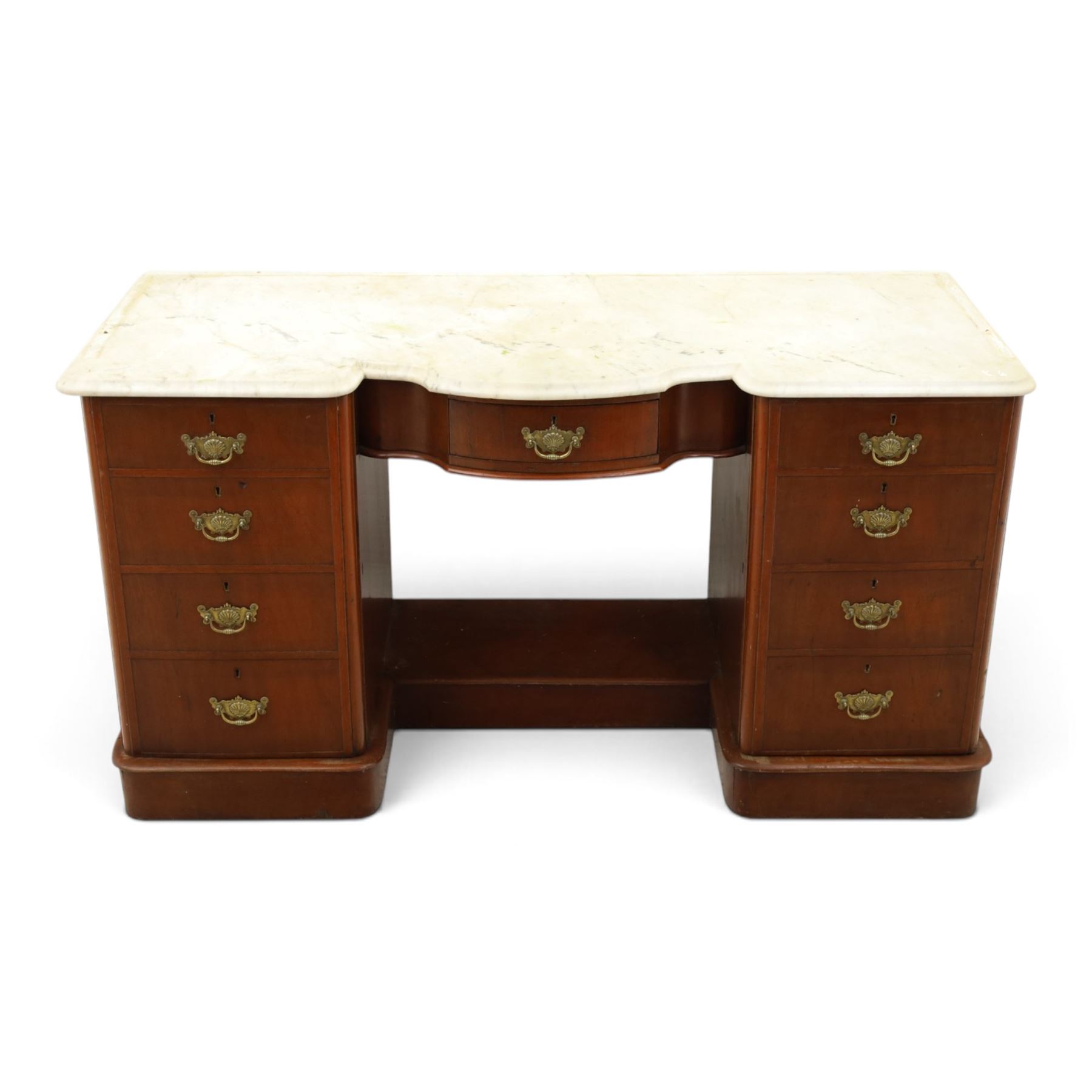 Victorian mahogany pedestal dressing table, shaped white marble top over central frieze drawer, flanked by two pedestal cupboards with four dummy drawer fronts and ornate brass handles, recessed kneehole with platform base, on plinth supports