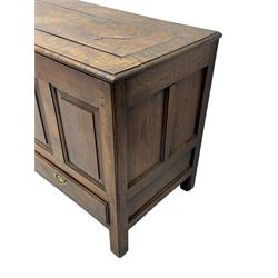 Georgian oak mule chest, moulded rectangular hinged lid over quadruple fielded panel front, the frieze inscribed '17 A Y 57', fitted with two drawers, panelled ends and back, on stile supports