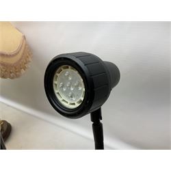 A Belcari figural table lamp, modelled as a young gent leaning upon brick wall, on turned wood base, signed, H70cm incl shade, together with bronzed figural table lamp of a lady with parasol upon ornate circular plinth base, two ceramic table lamps and another lamp (5)