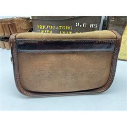 Miscellaneous shooting accessories - W.J. Bowman & Sons clay pigeon launcher; two leather cartridge belts; three cartridge bags; two canvas/leather game bags; and two metal/wooden cartridge boxes