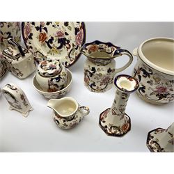 A group of Masons Ironstone Mandalay pattern wares, comprising large vase, planter with twin lug handles, three graduated plates, bowl, teapot, teacup and saucer, jug, smaller jug, open sucrier, small pot and cover, pair of candlesticks, small mantel clock, and pin dish. 