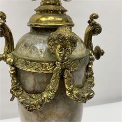 20th century five branch candelabra, with gilded floral garland and female mask decoration, to a marble effect resin urn and stepped base, upon four paw feet, H61cm