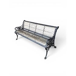 Victorian Andrew McLaren pattern cast iron bench, the ornate ends with detailed scrollwork, joined together with a cast iron seat and backrest frame supporting gently weathered oak slats, Victorian diamond stamp mark
