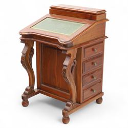 Victorian design mahogany Davenport desk, the sloped writing surface inset with tooled green leather and hinged to reveal a fitted interior, with a pen compartment to the raised gallery back, four drawers to each side, on carved scrolled supports with acanthus detail, raised on turned feet