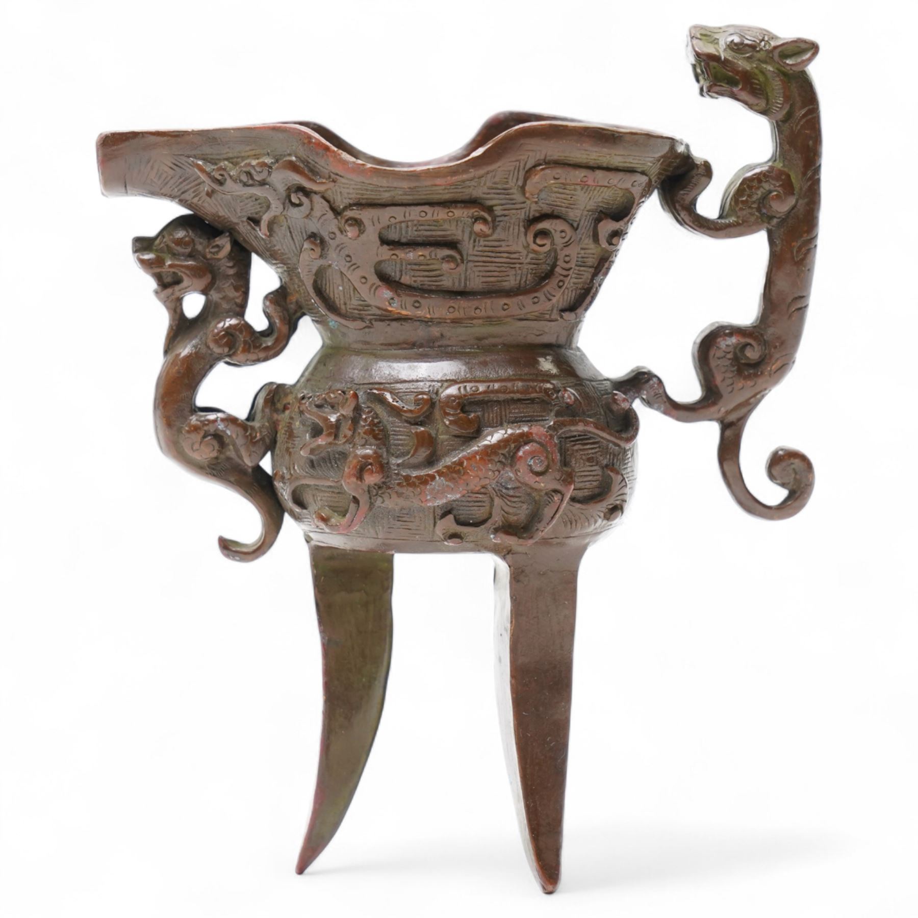 Chinese bronze libation cup with Zoomorphic handle on a tripod base H13cm