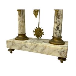 20th century French portico clock c1910 on a white veined marble base, gilt drum movement case supported between two marble columns with brass capitals and a suspended garland swag with a starburst pendulum beneath, enamel dial with Arabic numerals, floral decoration and Louis XV pierced gilt hands, convex glass and brass bezel, 8-day countwheel striking movement striking the hours and half hours on a bell. 




