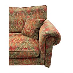 Duresta - 'Beaminster' grande two-seat sofa, traditional shape with rolled arms, upholstered in 'Althorp' russet and stone floral pattern fabric, on turned feet with brass castors
