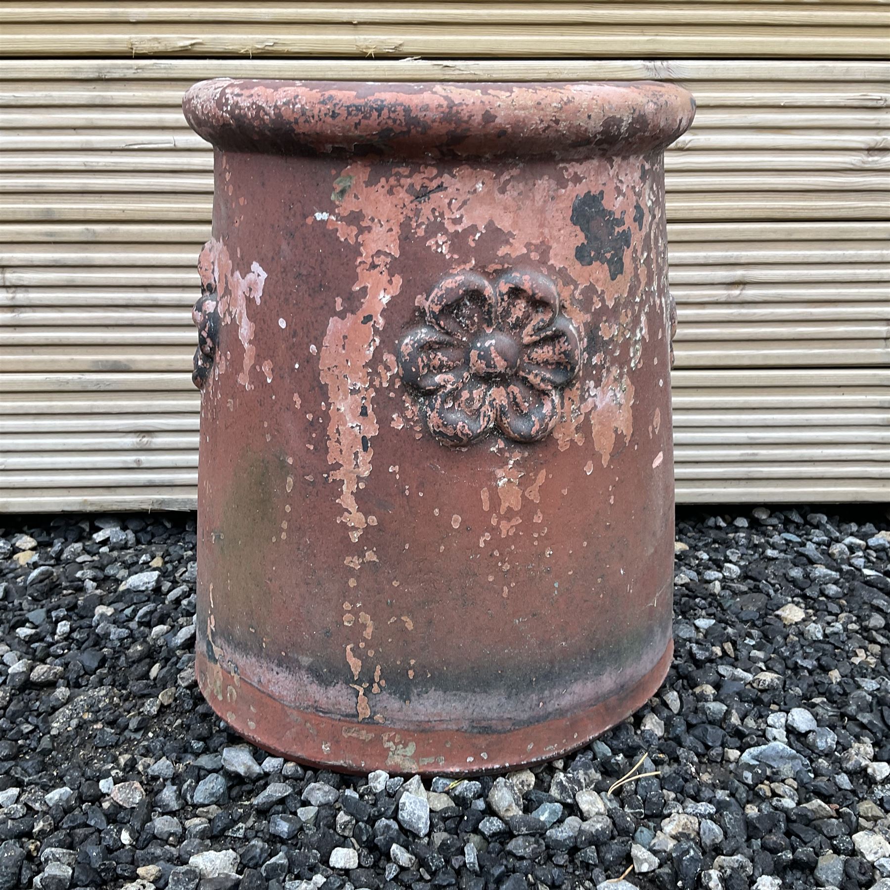 Terracotta chimney pot decorated with rose head motifs - THIS LOT IS TO BE COLLECTED BY APPOINTMENT FROM DUGGLEBY STORAGE, GREAT HILL, EASTFIELD, SCARBOROUGH, YO11 3TX