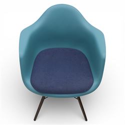 Vitra - Pair of Eames DAW armchairs, moulded plastic seats in teal with integrated armrests, blue upholstered seat cushions, supported on stained wooden dowel legs with black wire cross bracing
