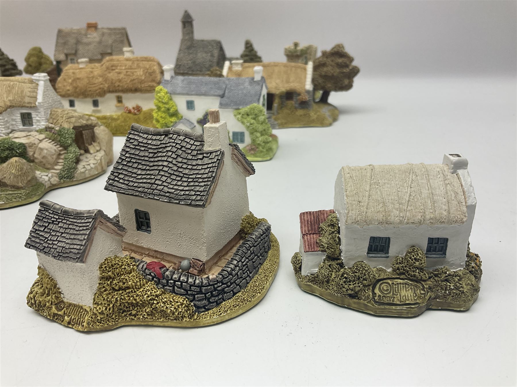 Sixteen Lilliput Lanes from the Irish Collection, to include Kilmore Quay, Causeway Cottage, Blarney Castle, Quite Cottage etc, all with boxes and deeds 
