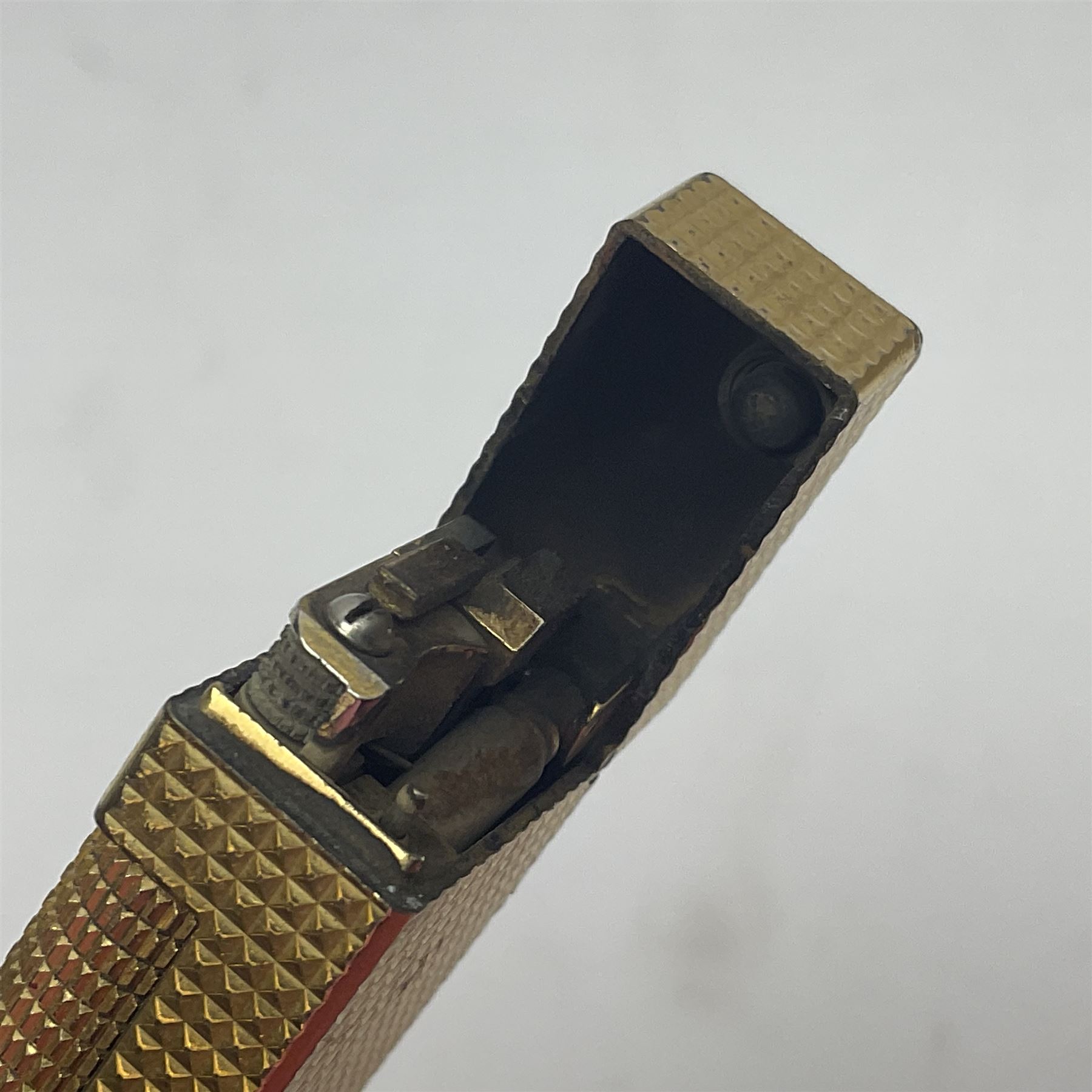 Dunhill gold plated dress lighter, in original fitted case with paperwork, together with a Dunhill rolagas lighter