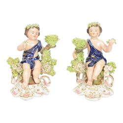 Pair of 19th century Stevenson and Hancock Derby figural chambersticks, each modelled as a...