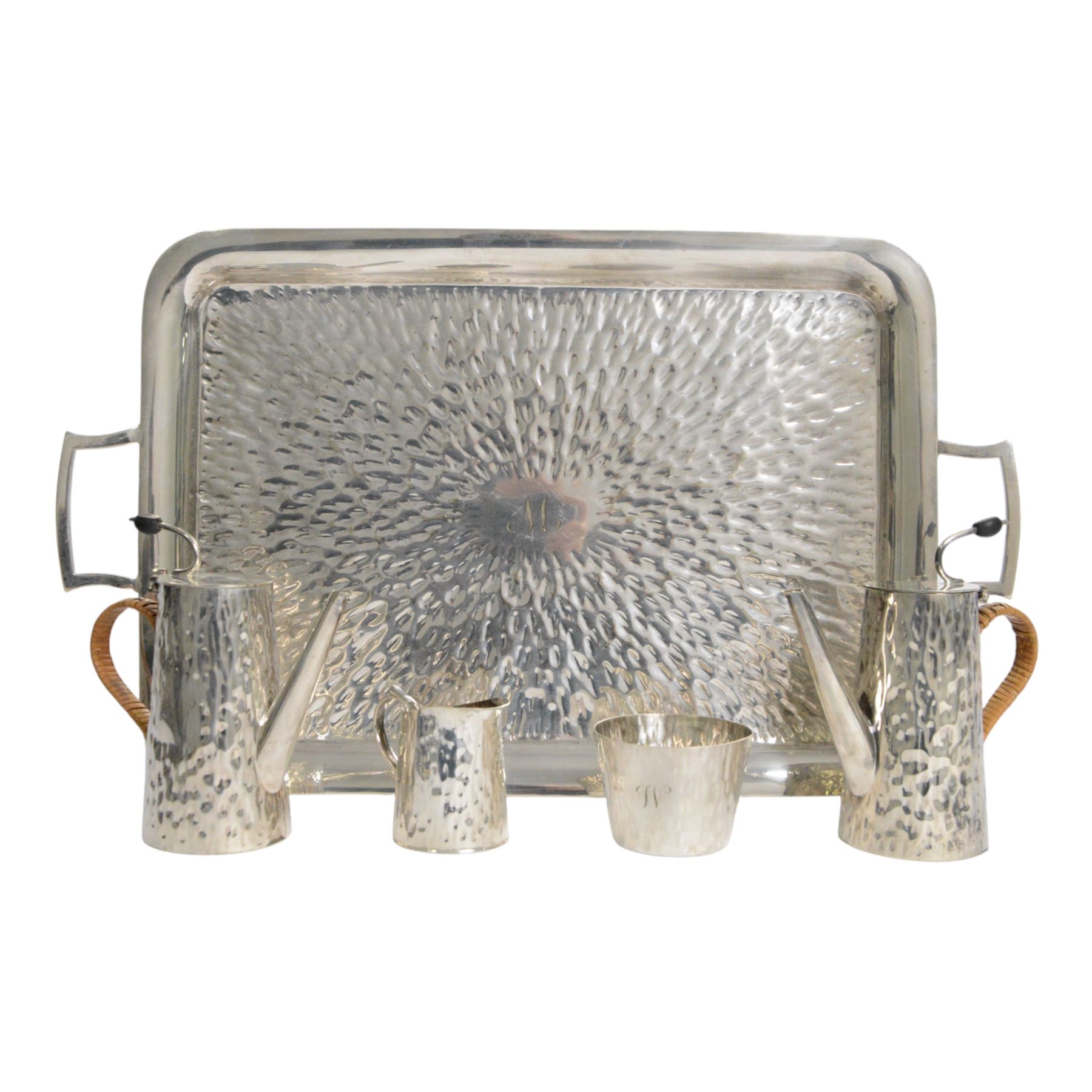 Hukin & Heath planished silver plate coffee tray attributed to Christopher Dresser, with similar coffee set comprising pair of coffee pots, of cylindrical tapering form with strapwork handles, milk jug and open sucrier, all engraved with initial to center, tray L48cm 