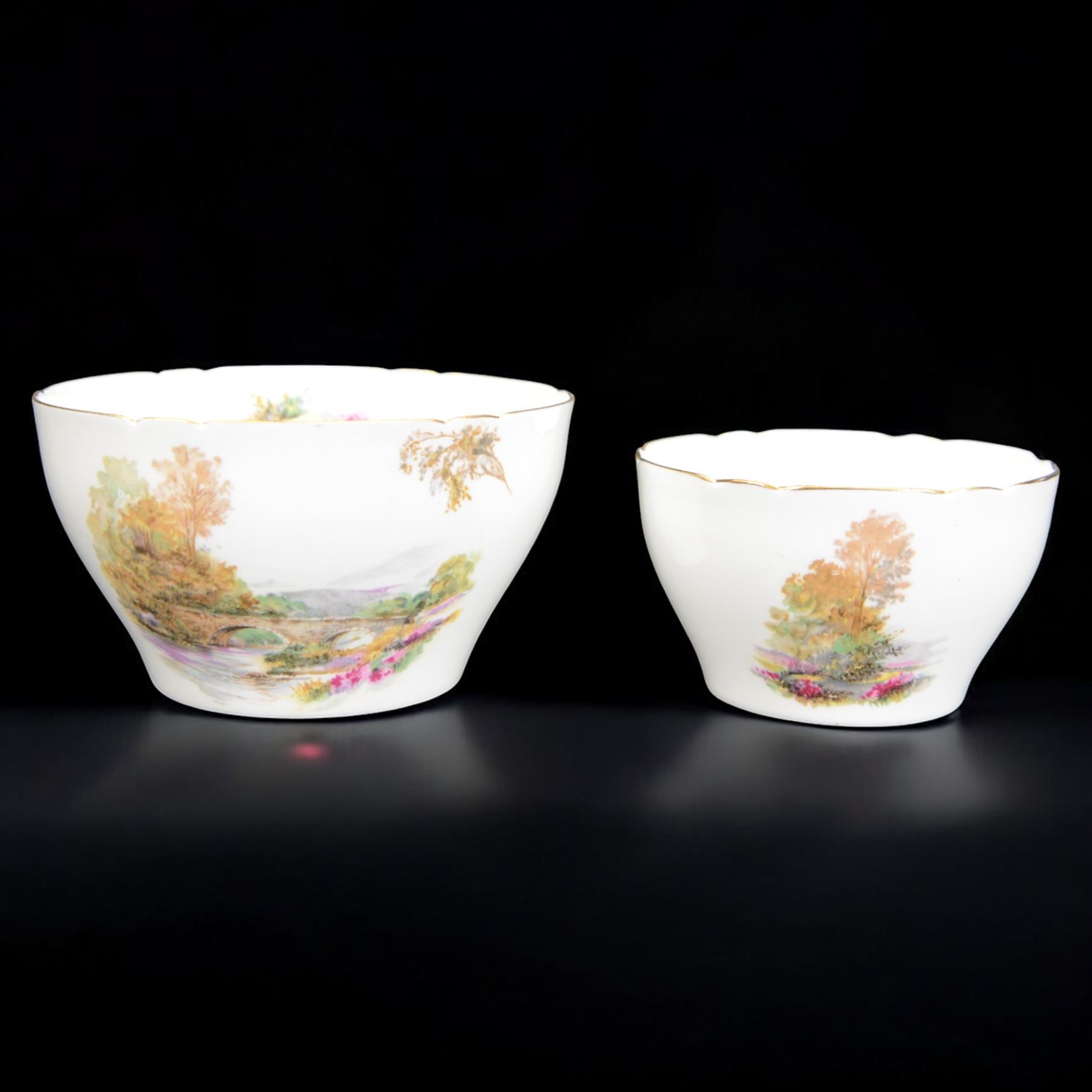 Shelley Heather pattern coffee service for six, including coffee pot, milk jug, two open sucrier, coffee cups and saucers, tea cups and saucers, etc