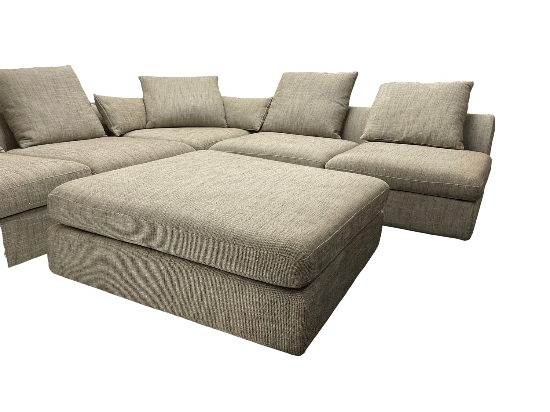 Contemporary corner sofa upholstered in grey fabric (310cm x 282cm); with matching rectangular footstool (110cm x 110cm)