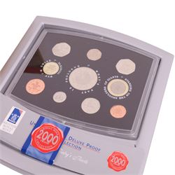The Royal Mint United Kingdom 2000 Deluxe Proof set and The Royal Mint United Kingdom 2003 Executive Proof set (2)