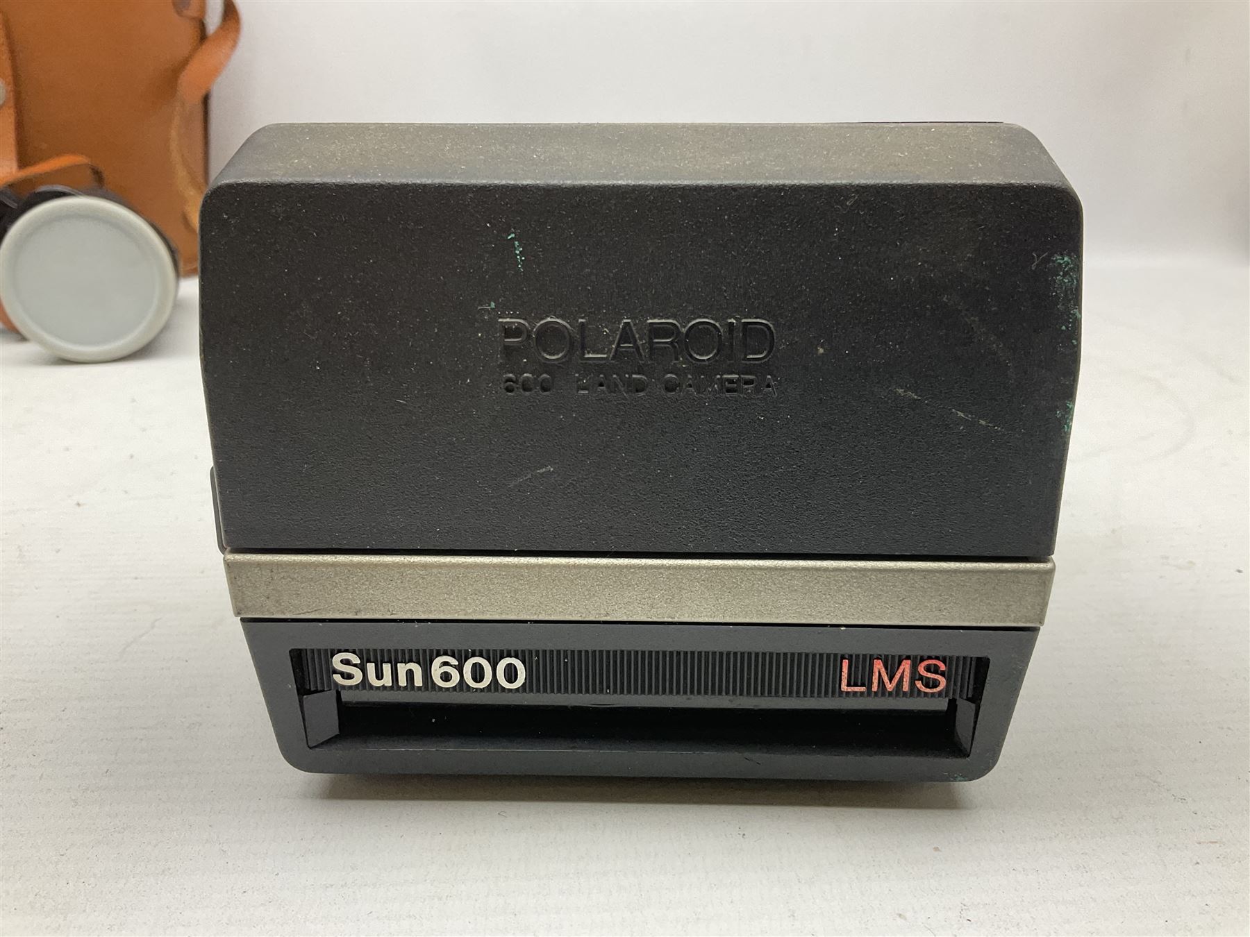 Brass telescope, together with Zenith 7 x 50 field binoculars, two polaroid cameras and other cameras and equipment 