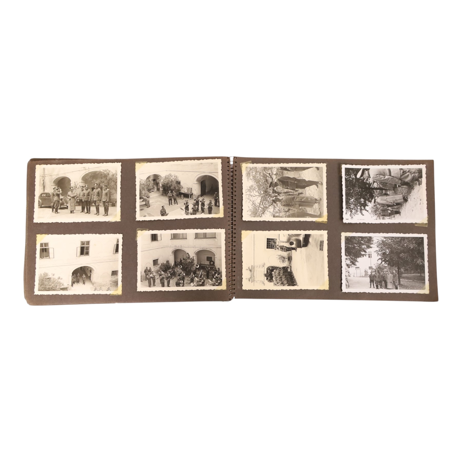 WWII German Soldiers photo album, 1942, including photographs of soldiers in uniform posing during parade etc  