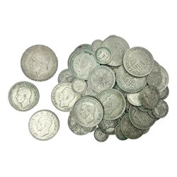 Approximately 395 grams of Great British pre 1947 silver coins, including George V 1935 crown, half crowns, shillings etc 