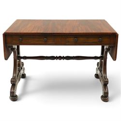 Fine 19th century figured mahogany sofa table, the rectangular twin drop-leaf top with rou...