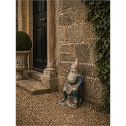 Early large scale composite stone garden gnome, original distressed paint