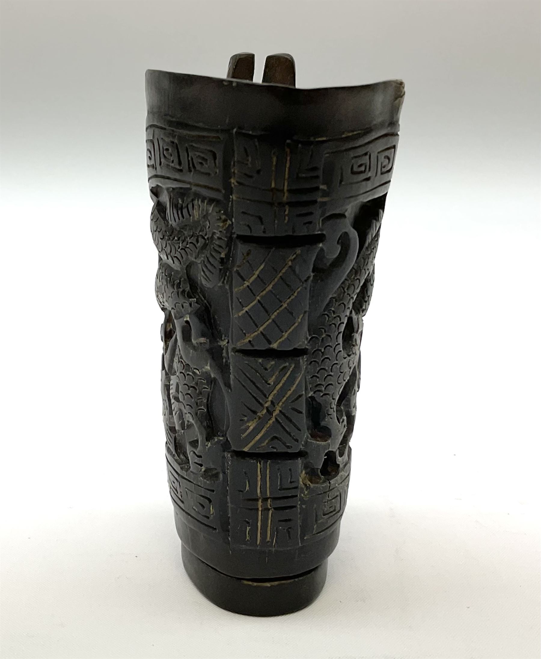 Chinese horn blood collection cup, carved with dragons and key fret border, H9.5cm