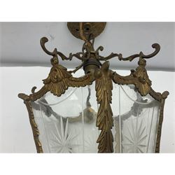 Edwardian floral cast gilt brass hall lantern of tapered pentagonal form, the five glass panels with etched decoration, overall approx L36cm excl chain