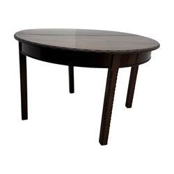 Early 20th century mahogany demi-lune table, the circular top with carved foliate border, raised on square section supports with relief carved edges