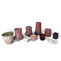 Two Victorian terracotta octagonal squat chimney pots, three other pots, terracotta plante...
