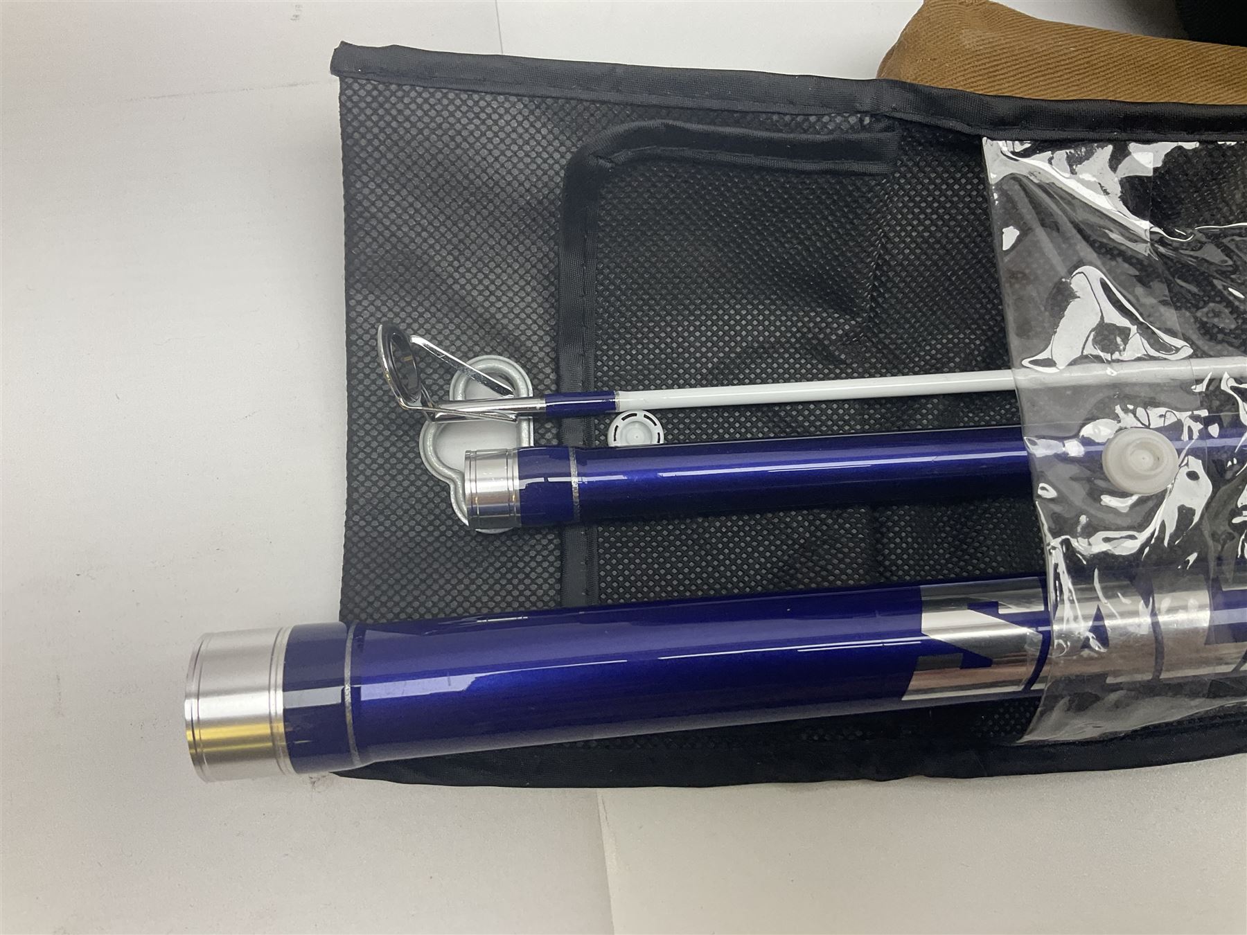 Collection of fishing memorabillia and equipment, including an Allcocks three piece split cane trout fly rod, Shakespeare Salt 3600 surf rod, two tackle bags, Old Red Seastreak multiplier reel, Sportext Saltwater fixed spool reel, fishing dvds, etc