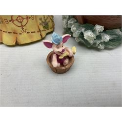 Five Disney Winnie The Pooh snow globes, to include Pooh and Piglet Sailing, Pooh's Grand Adventure and Blustery Day, together with The Walt Disney Classic Waterglobe collection globe and group Tigger, Winnie and Piglet figure under dome, all with boxes (7)