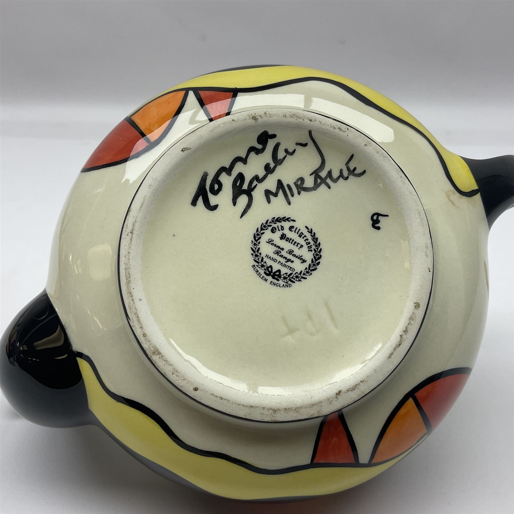 Lorna Bailey Mirage pattern teapot, together with Lorna Bailey batmobile egg cup, both signed beneath, teapot H10cm