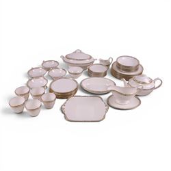 Spode Golden Trellis tea and dinner service for eight, including teapot, milk jug, open sucrier, teacups and saucers, dinner plates, soup bowls, side plates etc 