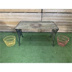  Cast iron and wood slatted garden table and pair of metal hanging baskets  - THIS LOT IS TO BE COLLECTED BY APPOINTMENT FROM DUGGLEBY STORAGE, GREAT HILL, EASTFIELD, SCARBOROUGH, YO11 3TX