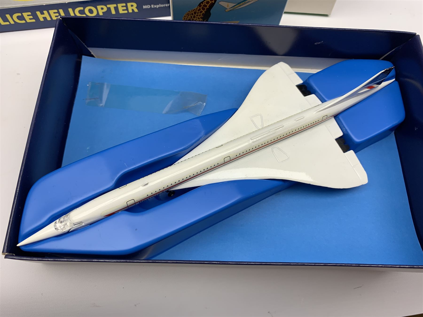 Three Schabak 1/250th scale die-cast models of Concorde, all boxed; nine boxed promotional models of airliners; Richmond Toys model of Wiltshire Police Helicopter and Air Ambulance, boxed; nine unboxed die-cast models of aircraft; and factory sealed Airfix plastic model kit of a Supermarine Spitfire VB