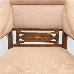 Quality Edwardian seven piece inlaid salon suite, comprising three seater settee, pair of arm chairs and four chairs with pierced splat backs, upholstered in pale pink fabric, inlaid with flowering urns, upon tapering legs with spade feet and castors