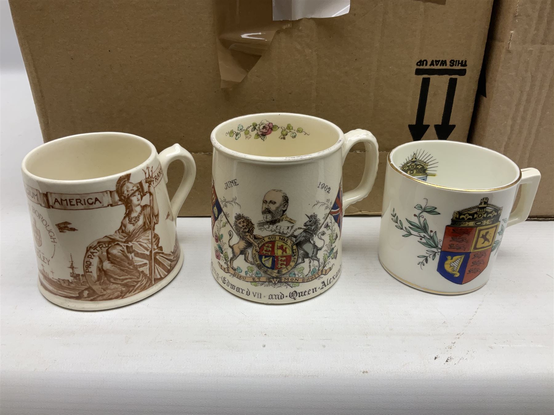 Collection of Victorian and later commemorative mugs, to include Queen Victoria 1887 Jubilee cup, Rd No. 64761, Royal Doulton Victory and Peace mug, 1919, Rd 666159, Royal Doulton King Edward VII blue transfer coronation, Royal Doulton 1937 George Coronation, Harrods Limited Rulers Of An Empire on Which The Sun Never Sets, Royal Worcester Victory in the Gulf, two Shelley examples, Spode limited edition Queen Elizabeth II Golden Jubilee etc in two boxes