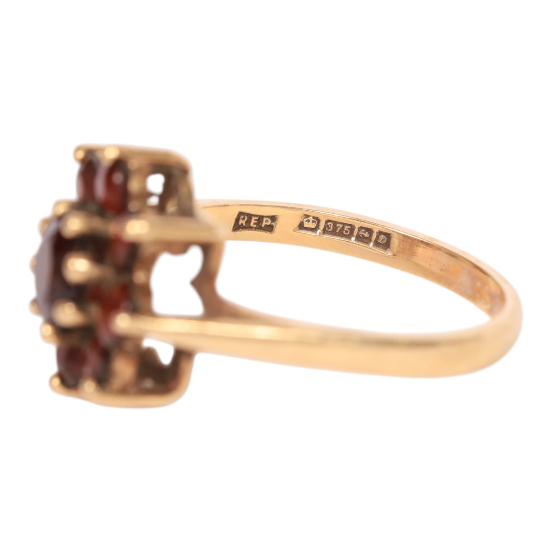 9ct gold garnet ring and a pair of 9ct gold stone set stud earrings