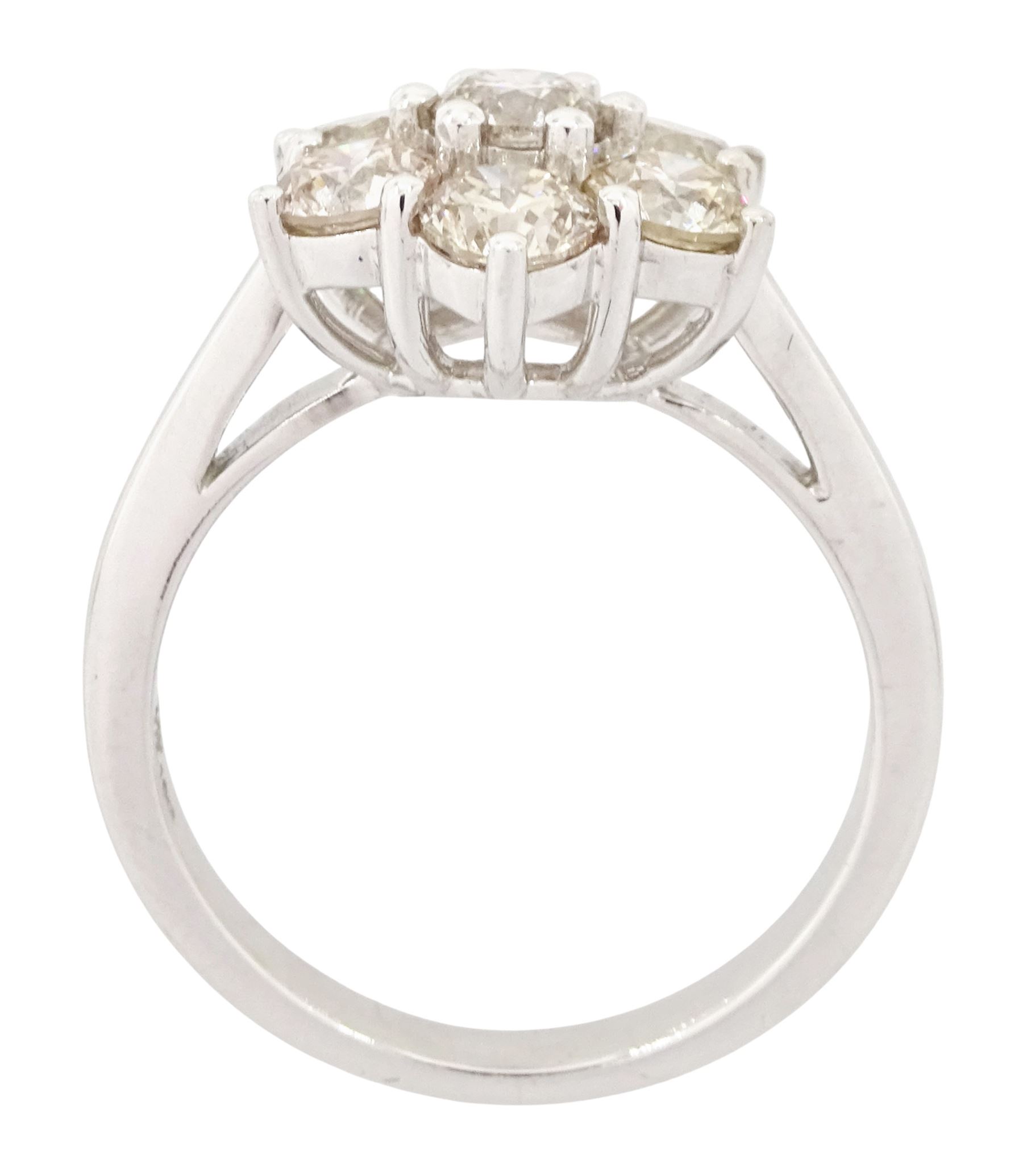 18ct white gold diamond daisy cluster ring, set with seven round brilliant cut diamonds, stamped 750, total diamond weight 2.16 carat, with World Gemological Institute report