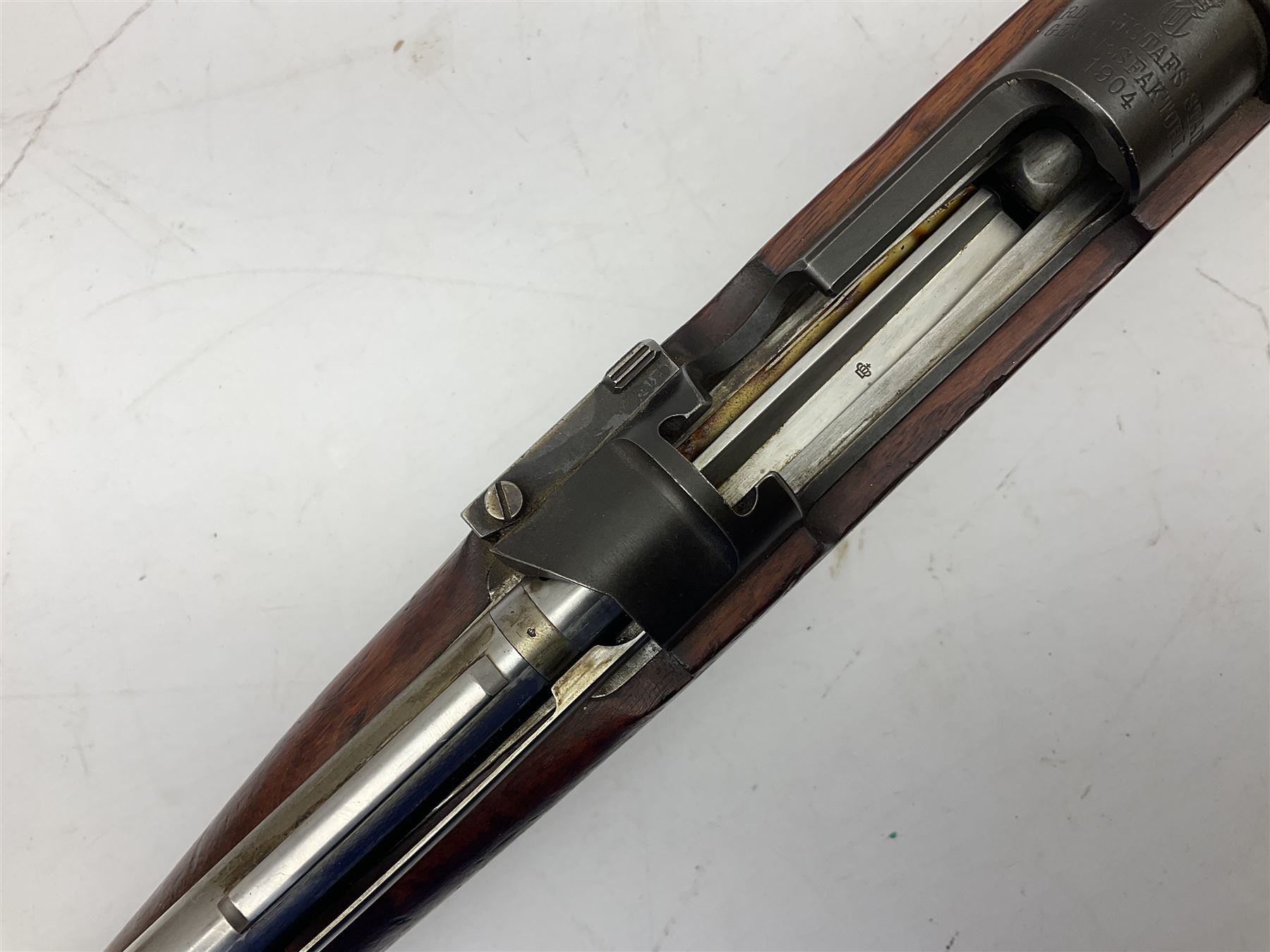 Early 20c Swedish 6.5mm bolt-action service rifle inscribed Carl Gustafs Stads Gevarsfaktori 1904; with 74cm barrel and original Model 1896 knife bayonet with scabbard No.149918 L149cm overall. Deactivated to early specification so requires re-deactivation to modern standards SECTION 1 RFD ONLY