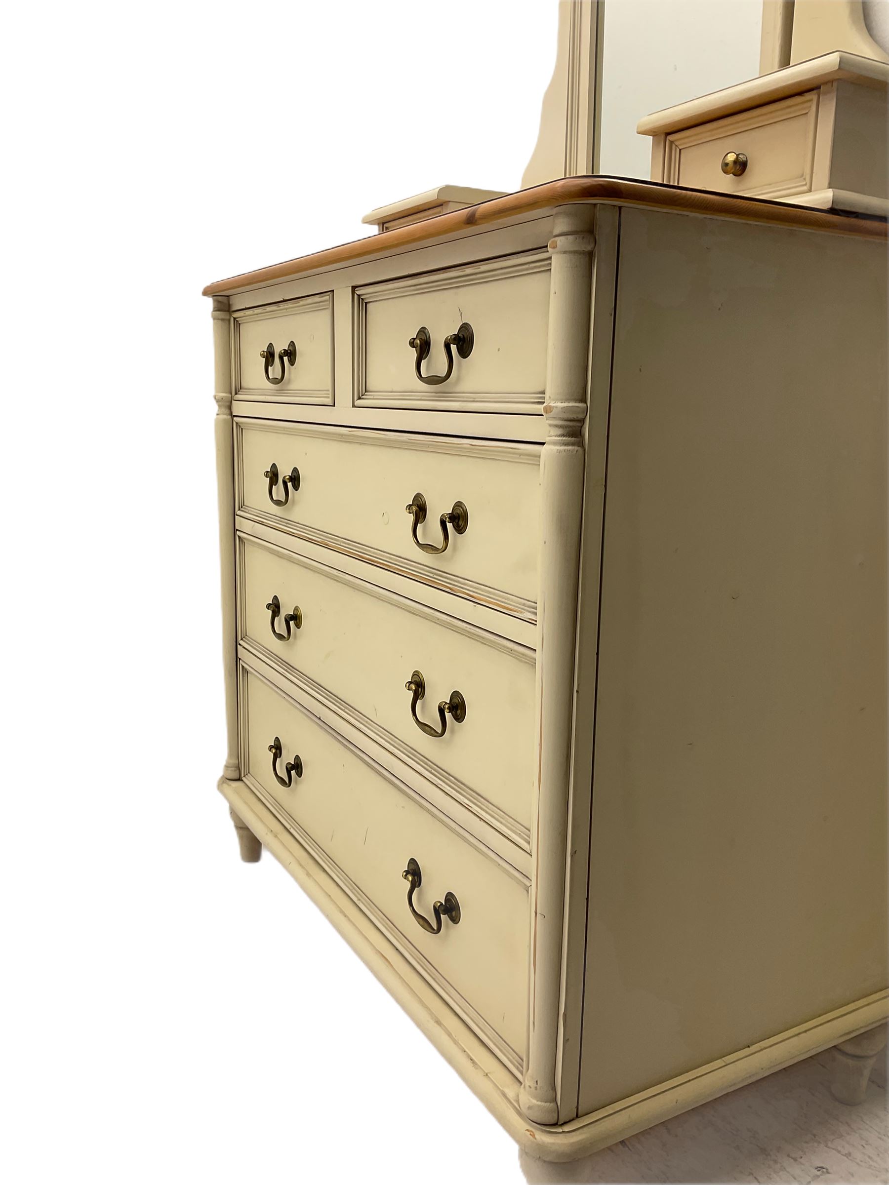 Laura Ashley pine and cream finish vanity chest, fitted with two short and three long drawers, swing mirror back