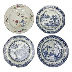 18th century Chinese Famille Rose plate, with painted decoration of a bird upon branch with peonies, together with three Chinese blue and white plates, each decorated with a river and pagoda scene, largest D23cm