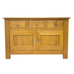 Oak sideboard, fitted with three drawers and two panelled cupboards