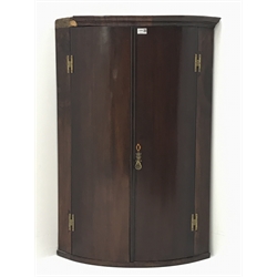  George III mahogany bow corner cabinet, two doors enclosing three shelves, W74cm, H107cm  