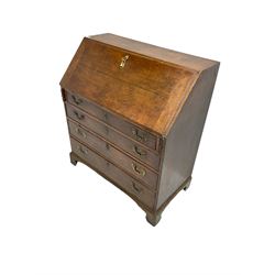 George III oak fall front bureau, the interior fitted with hidden compartments, drawers and pigeon holes, four long graduating drawers, on bracket feet